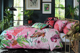 House of Norris exotic cotton bedding set with pink floral and animal print duvet cover in stylish bedroom