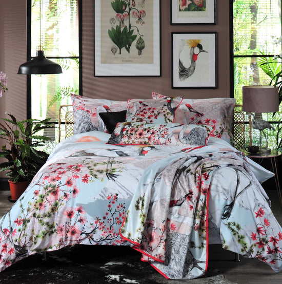 House of Norris luxury floral bedding set with colorful flowers and bird designs on duvet cover and pillows